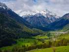View towards village Lavin in the Lower Engadin in Grisons, Switzerland. Art Print